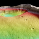 Illustration for article titled Behold Tharsis Tholus, Mars technicolor dream volcano!